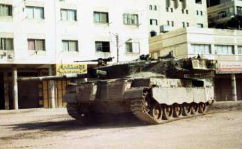 Tank imposing curfew at Amman Road.